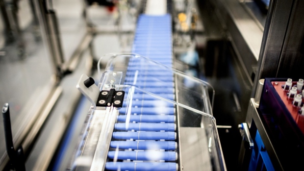 Injection pens move along a conveyor at the Novo Nordisk A/S production facilities in Hillerod, Denmark, on Tuesday, Sept. 26, 2023. Novo's Ozempic and Wegovy injectable drugs, a class of medicines known as GLP-1s, have been causing ripple effects across the stock market, for the makers of everything from snacks to booze.