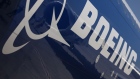 A logo on the body of a Boeing Co. 777-9, a variant of the 777X, passenger aircraft at the Dubai Air Show in Dubai, United Arab Emirates, on Monday, Nov. 13, 2023. The 2023 Dubai Air Show kicked off on Monday with high expectations of large deals, continuing the prevailing theme of this year that’s seen airlines commit to huge orders.