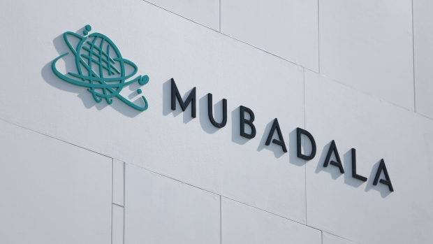 Signage for Mubadala at the company's pavilion at the Dubai Air Show in Dubai, United Arab Emirates, on Monday, Nov. 13, 2023. The 2023 Dubai Air Show kicked off on Monday with high expectations of large deals, continuing the prevailing theme of this year that’s seen airlines commit to huge orders.