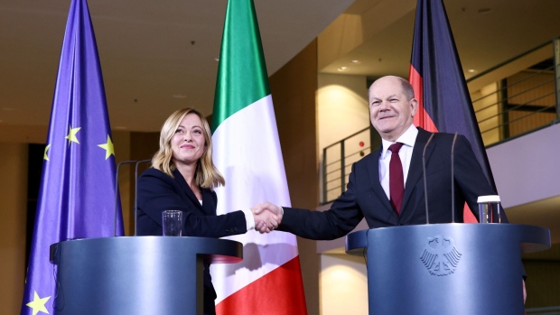 Olaf Scholz, Germany's chancellor, right, and Giorgia Meloni, Italy's prime minister, shake hands ahead of their meeting at the chancellery in Berlin, Germany, on Wednesday, Nov. 22, 2023. A string of fiscal wins for Rome has just coincided with a crisis rocking Chancellor Olaf Scholz's coalition in Berlin after a calamitous court judgment cast doubt on the financing plans for Europe's biggest economy.
