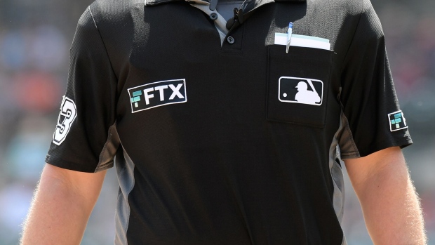 The FTX logo on a Major League Baseball umpire’s uniform during a game in 2022.