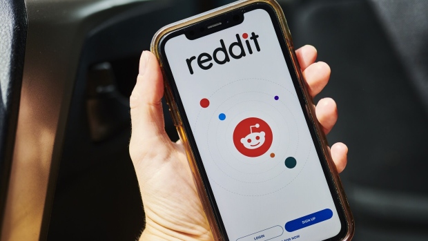 Reddit Inc. signage is displayed on a smartphone in an arranged photograph taken in the Brooklyn borough of New York, U.S., on Tuesday, June 30, 2020.  Photographer: Gabby Jones/Bloomberg