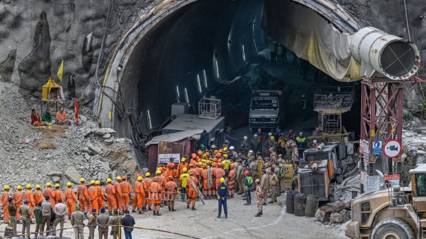Rescue workers near the collapsed Silkyara tunnel in Uttarakhand state, India, on Nov. 28. Photographer: Sajjad Hussain/AFP/Getty Images