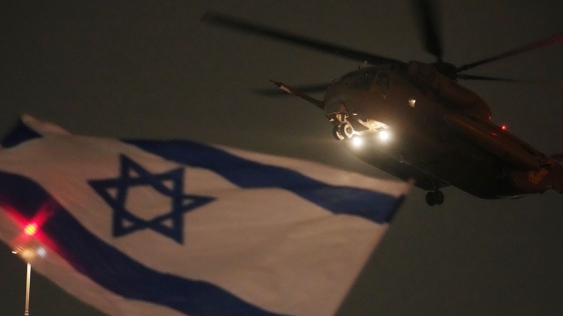 A helicopter arrives with Israeli hostages released by Hamas on Nov. 26 in Petah Tivka, Israel.