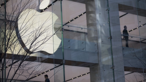 An illuminated Apple Inc. logo on its store in Sydney, Australia, on Sunday, Sept. 3, 2023.\ Photographer: Brent Lewin/Bloomberg
