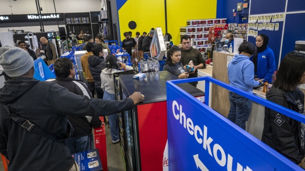 Shoppers wait to check out out a Best Buy store in Union City, California, during this year’s Black Friday.
