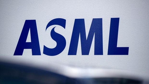 A logo at the ASML Holding NV manufacturing plant in Berlin, Germany, on Wednesday, Jan. 5, 2022. ASML shut a part of its German manufacturing site after a fire earlier this week, causing concern the closing could exacerbate a global chip shortage. Photographer: Krisztian Bocsi/Bloomberg