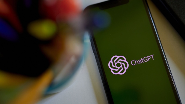 The ChatGPT logo on a smartphone arranged in the Brooklyn borough of New York, US, on Thursday, March 9, 2023. ChatGPT has made writing computer code and cheating on homework easier. Soon, it could make email scams a cinch. That's the warning from Darktrace Plc, the British cybersecurity firm.