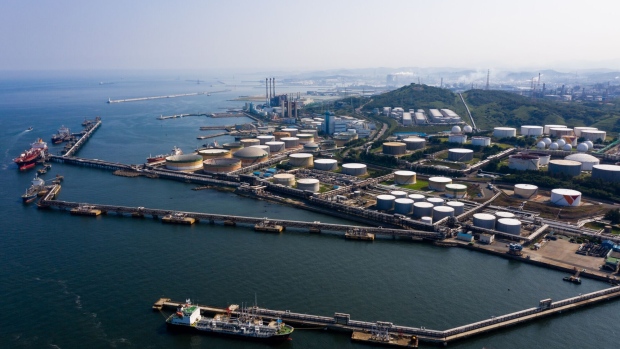 Tankers sit moored at a port near SK Innovation Co.'s Ulsan Complex oil refinery facilities in this aerial photograph taken above Ulsan, South Korea, on Sunday, Aug. 4, 2019.  Photographer: SeongJoon Cho/Bloomberg