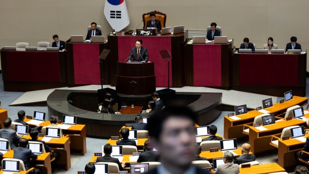 Yoon Suk Yeol, South Korea's president, delivers a budget speech at the National Assembly in Seoul, South Korea, on Tuesday, Oct. 31, 2023. South Korean banking stocks slumped Monday after Yoon expressed sympathy for the country’s mom-and-pop business owners suffering from high interest rates.