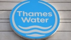 A logo outside the headquarters of Thames Water in Reading, UK, on Monday, July 3, 2023. The bonds of the UK's biggest water provider climbed on Monday as investors bet a selloff driven by fears the utility would be nationalized had gone too far. Photographer: Hollie Adams/Bloomberg