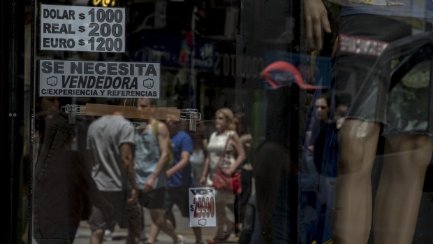 A foreign currency sign at a store in Buenos Aires, Argentina, on Tuesday, Nov. 21, 2023.