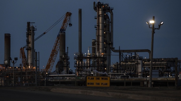 An oil refinery in Edmonton, Alberta, where resistance to the Trudeau government's new limits on emissions is likely to be stiff. Photographer: Jason Franson/Bloomberg