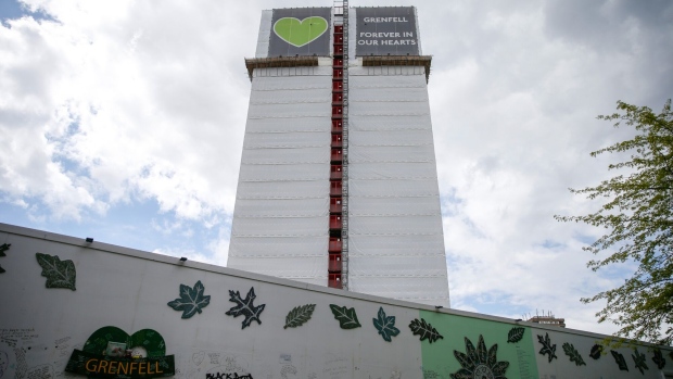 The remains of Grenfell Tower in North Kensington, London, U.K., on Wednesday, May 12, 2021. An extreme example of gentrification is the district of Notting Hill, synonymous with slums and race riots in the postwar period before turning into one of the most highly coveted parts of the British capital.