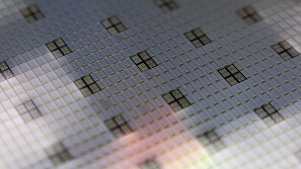 Close-up of a semiconductor wafer . Photographer: Bloomberg Creative Photos/Bloomberg Creative Collection