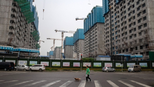 Residential buildings under construction in Beijing, China, on Friday, Aug. 11, 2023. China's securities watchdog plans to hold a meeting on the real estate market on Friday, according to people familiar with the matter, underscoring growing urgency among regulators to deal with a worsening property crisis.