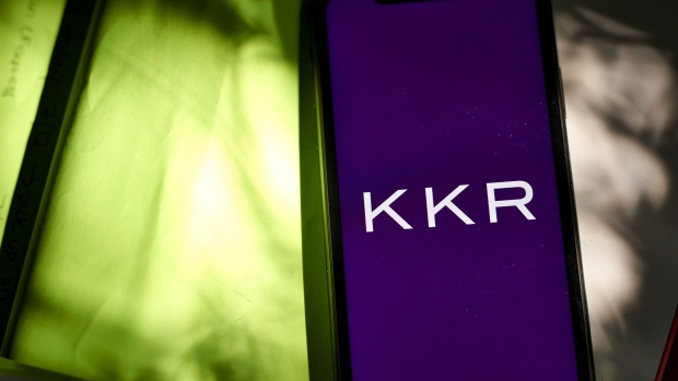 The KKR & Co. logo on a smartphone arranged in the Brooklyn borough of New York, US, on Wednesday, July 12, 2023. KKR & Co. is exploring options for its majority stake in a commercial lighting manufacturer in China including a potential sale, according to people familiar with the matter. Photographer: Gabby Jones/Bloomberg