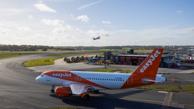 A passenger aircraft operated by EasyJet Plc, on the tarmac at London Luton Airport in Luton, UK, on Monday, Nov. 6, 2023. EasyJet is due to report their full-year results on Nov. 28.