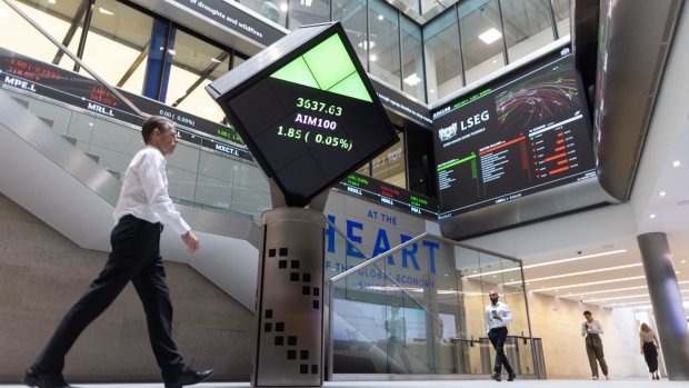 Stock price information displayed in the London Stock Exchange Group Plc's office atrium in the City of London, UK, on Tuesday, Aug. 1, 2023. LSE will report their first-half results on Thursday, Aug. 3. Photographer: Chris Ratcliffe/Bloomberg