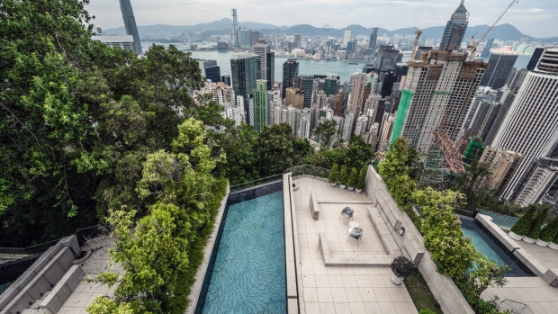 A swimming pool at a house at the Twenty Peak Road by V residential project in Hong Kong, China, on Monday, Oct. 31, 2022. Real estate has remained at the center of Hong Kong’s $368 billion economy, mainly through wealth created by high valuations — a result of the territory’s scarce land resources. Photographer: Lam Yik/Bloomberg