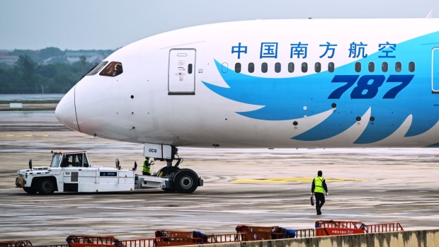 A Boeing 787 plane is seen at the Tianhe Airport in Wuhan, in Chinas central Hubei province on May 29, 2020.  Photographer: Hector Retamal/AFP/Getty Images