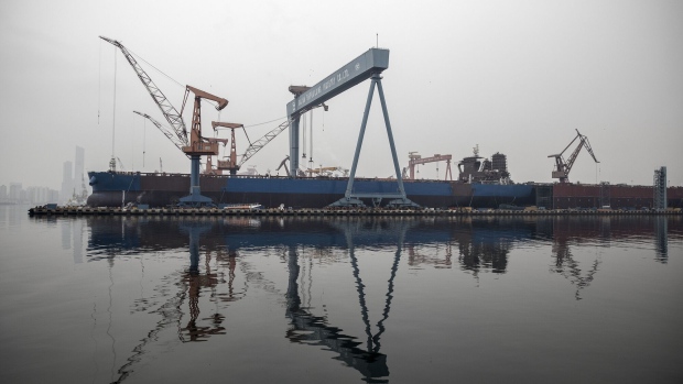 A ship-building yard in Dalian, China. Photographer: Qilai Shen/Bloomberg