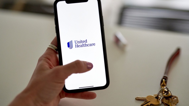 The UnitedHealth logo on a smartphone arranged in New York, US, on Friday, July 7, 2023. UnitedHealth Group Inc. is scheduled to release earnings figures on July 14.