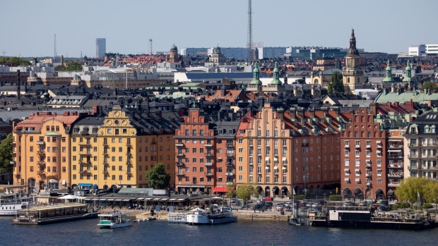 Buildings on the skyline by the harbour in Stockholm, Sweden, on Sunday, June 11, 2023. Swedish households are becoming more optimistic about the development in the housing market, according to a survey from the country’s largest bank. Photographer: Andrey Rudakov/Bloomberg