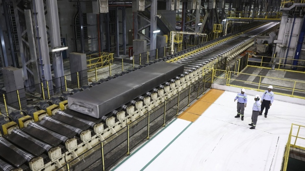 Ma'aden workers monitor an aluminium rolling mill at the Ras Al Khair Industrial City in Saudi Arabia.