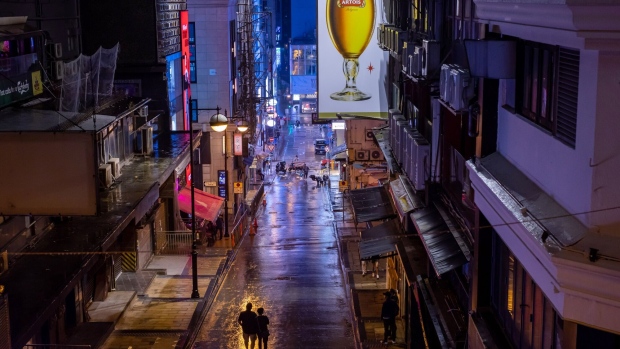 A near-deserted Lan Kwai Fong, Hong Kong’s main nightlife district, in March 2020. Photographer: Paul Yeung/Bloomberg