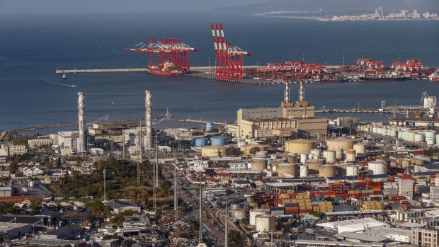 Shipping containers and cranes at the Port of Haifa, in Haifa, Israel, on Tuesday, Jan. 31, 2023. Indian billionaire Gautam Adani’s joint venture last year won a tender to buy the port for around $1.2 billion.