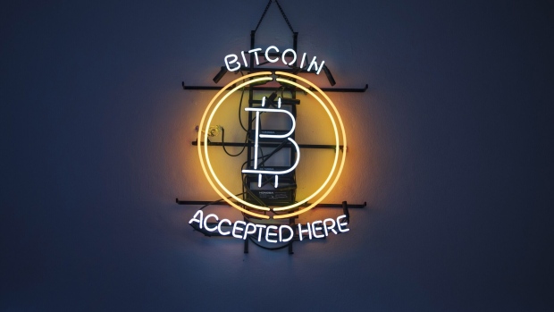 A neon sign indicates that Bitcoin is accepted inside the venue of the Paralelni Polis project, an organization combining art, social sciences and modern technology, in Prague, Czech Republic, on Friday, Jan. 5, 2024. Bitcoin has been on a tear ahead of an upcoming Jan. 10 deadline that could see the US Securities and Exchange Commission approve the first exchange-traded fund tied directly to the asset’s spot price.