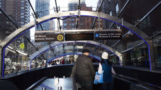 Commuters arrive at the newly opened 96th Street station on the Second Avenue subway line in New York, U.S., on Sunday, Jan. 1, 2017. The first train departed the 96th Street station at noon after a speech by New York Governor Andrew Cuomo.