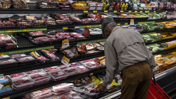 A customer shops for groceries in a supermarket in San Francisco. Photographer: David Paul Morris/Bloomberg