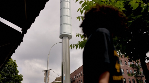 A 5G tower on the corner of West Burnside Avenue in the Bronx borough of New York, US, on Tuesday, June 27, 2023. In New York, an Upper East Side enclave is fighting city plans for curbside 5G towers, calling them "garish" and unnecessary, in a campaign that presages battles around the US sparked by an explosion in wireless gear on public streets.