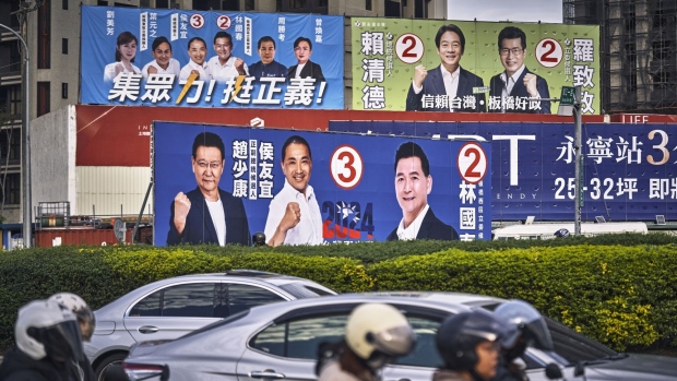 Campaign posters for various legislative member candidates in Taipei, Taiwan, on Wednesday, Dec. 27, 2023. Next month Taiwan holds presidential and legislature elections that will help shape US-China relations for years to come. Photographer: An Rong Xu/Bloomberg 