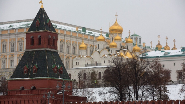 Golden church domes sit beyond fortified walls in the Kremlin palace complex in Moscow, Russia, on Thursday, Nov. 10, 2016. Russia is realistic about limits on the prospects for an immediate improvement in relations with the U.S. after President-elect Donald Trump takes office, according to President Vladimir Putin’s spokesman.