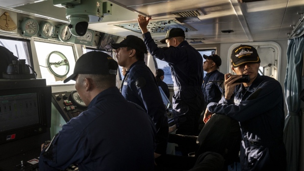 Philippine Coast Guard personnel onboard the BRP Sindangan during a resupply mission to the BRP Sierra Madre vessel in the disputed Second Thomas Shoal in the South China Sea.