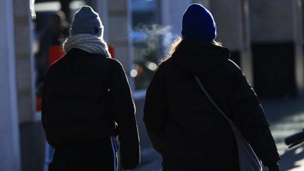 Pedestrians during freezing temperatures in Berlin, Germany, on Monday, Jan. 8, 2024. The Arctic blast that caused havoc across the Nordic region last week has spread south to cover most of continental Europe.