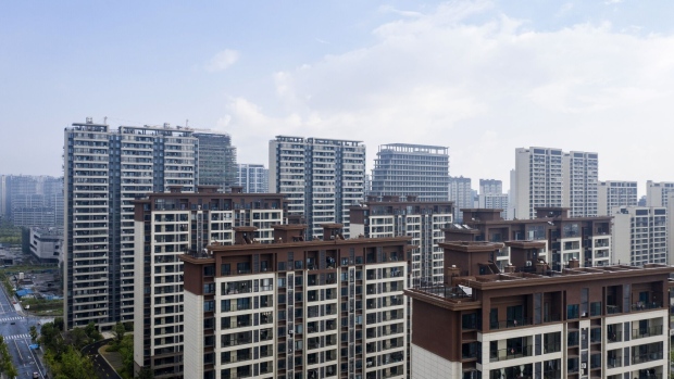 Residential buildings at the Legend of Sea project, co-developed by Country Garden Holdings Co. and Jiangsu Zhongnan Construction Industry Group Co., in Ningbo, China, on Wednesday, Aug. 16, 2023. Country Garden, one of China's largest developers, is wobbling and has less than 30 days to avoid a default on its bonds, the latest signal of the government’s struggle to end the nation’s property slump as the economy slows. Photographer: Qilai Shen/Bloomberg