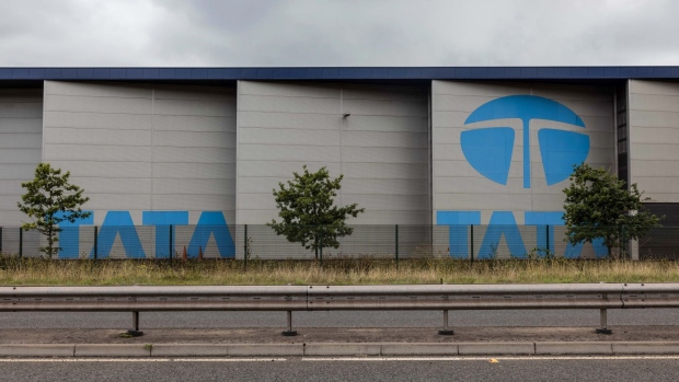 The Tata logo on a building at the steel works operated by Tata Steel Ltd. in Port Talbot, UK, on Wednesday, Aug. 17, 2022. Europe's heavy industry is buckling under surging power costs which are hitting energy-intensive manufacturers the hardest. Photographer: Hollie Adams/Bloomberg