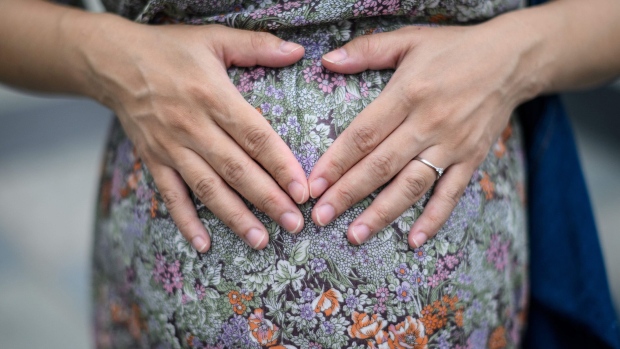 Pregnant woman. Photographer: ANTHONY WALLACE/AFP