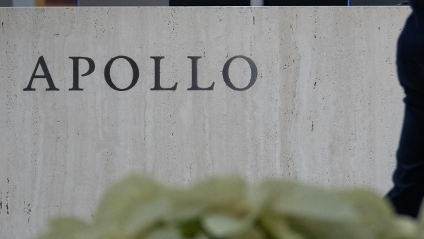 Apollo Global Management signage in New York, US, on Tuesday, Dec. 5, 2023. Apollo's CEO said it's getting harder for active managers to beat indexes in public markets and that it is easier for investors to find alpha in private markets. Photographer: Jeenah Moon/Bloomberg