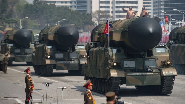 Unidentified rockets displayed during a military parade in Pyongyang, North Korea.  Photographer: Ed Jones/AFP/Getty Images
