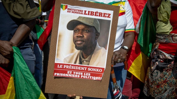 Supporters of Ousmane Sonko demonstrate in Paris, France, on Aug. 19. Photographer: Kiran Ridley/AFP/Getty Images