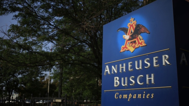 Signage outside the Anheuser-Busch Budweiser bottling facility in St. Louis, Missouri, U.S., on Thursday, July 8, 2021. Anheuser-Busch InBev is scheduled to release earnings figures July 29. Photographer: Luke Sharrett/Bloomberg