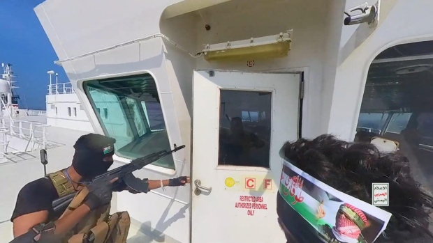 A still from a video showing Houthi fighters hijacking the ship Galaxy Leader on the Red Sea off the coast of Al Hudaydah, Yemen, on Nov. 20. Source: Getty Images