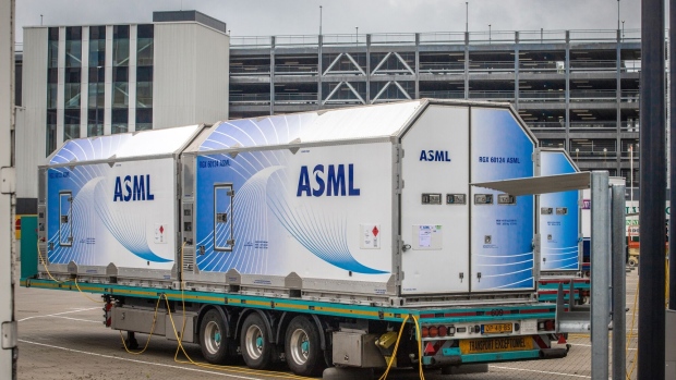 Specialised truck trailers in a parking bay at the ASML Holding NV global headquarters in Veldhoven, Netherlands, on Friday, Oct. 14, 2022. Veldhoven, a tidy small town in the Netherlands’s industrial heartland, has a zoo, a climbing park and, more recently, a brewing controversy over plans by ASML Holding NV to expand its headquarters. Photographer: Peter Boer/Bloomberg