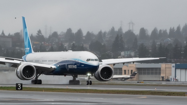 A Boeing airplane lands at the Boeing Field in Seattle, Washington.