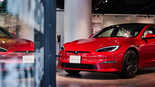 A Tesla Inc. Model S electric vehicle displayed at a Tesla Motors Japan store in Tokyo, Japan, on Friday, Aug. 18, 2023. Chief Executive Officer Elon Musk has arrived in Japan for his first known visit in nine years.